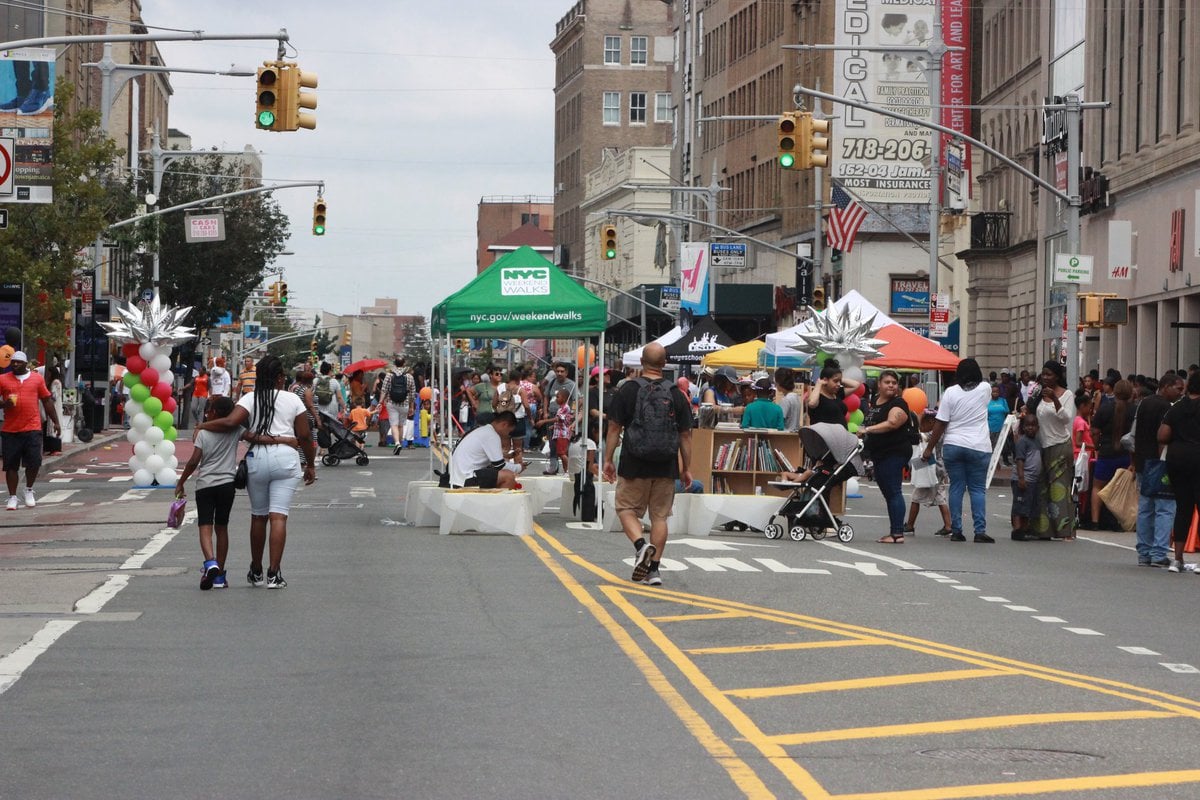 Image of busy street fair in Jamaica, Queens